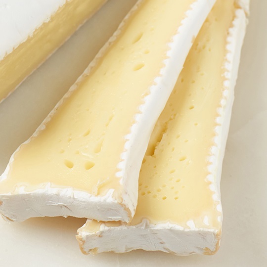 Calcium chloride solution is used to standardise the calcium ion concentration in cheese milk
